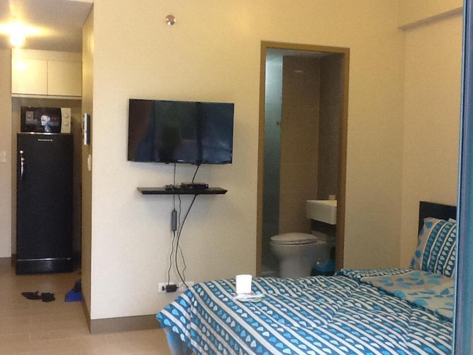 Palm Tree Genlex Condo Manila Bagian luar foto