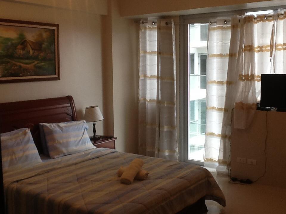 Palm Tree Genlex Condo Manila Bagian luar foto