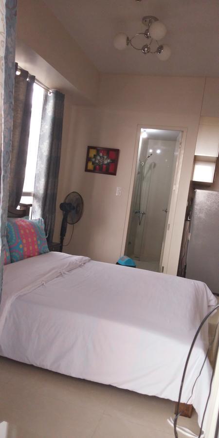 Palm Tree Genlex Condo Manila Bagian luar foto