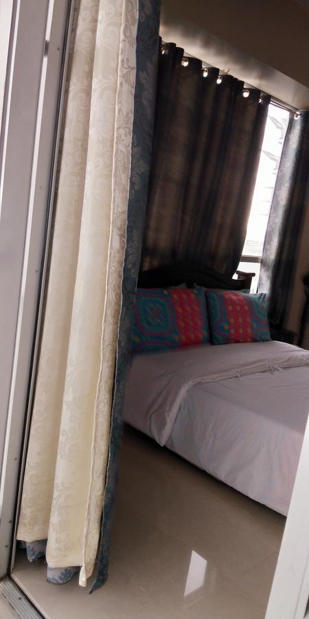 Palm Tree Genlex Condo Manila Bagian luar foto