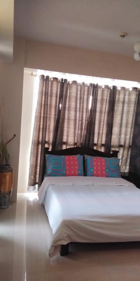 Palm Tree Genlex Condo Manila Bagian luar foto